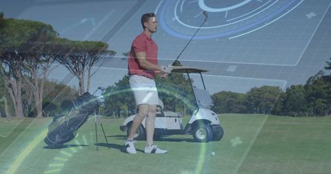 Male golfer lining up shot with augmented reality hud on sunny fairway with golf cart
