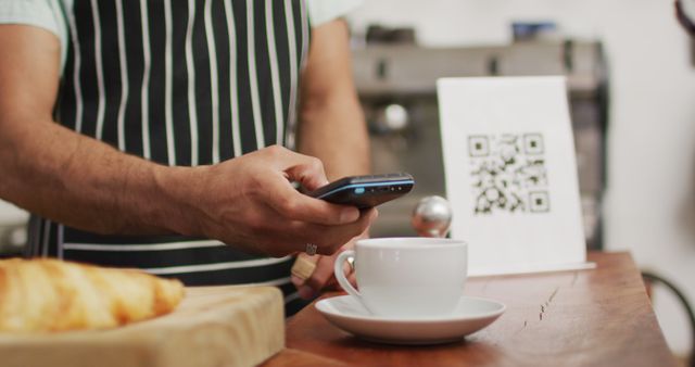 Barista Using Smartphone for Contactless Payment in Coffee Shop - Download Free Stock Images Pikwizard.com