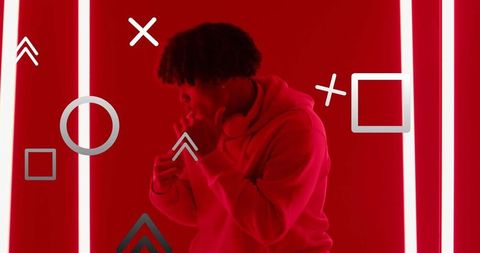 Man adjusting headphones with futuristic neon lighting