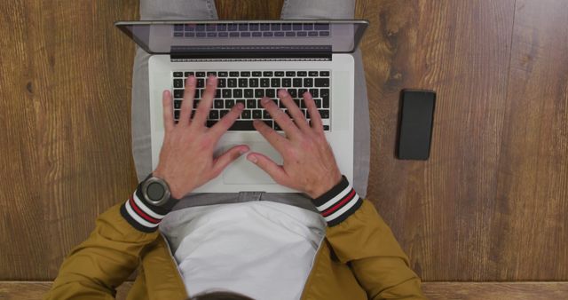 Man Typing on Laptop at Wooden Desk - Download Free Stock Images Pikwizard.com