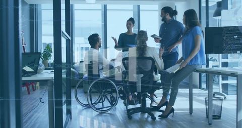 Diverse Team Collaboration with Disability Awareness in Modern Office