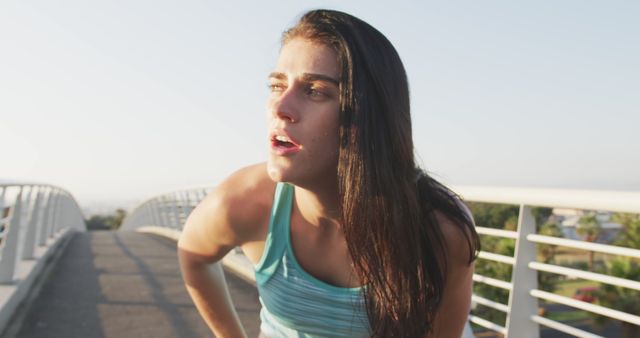 Exhausted Woman Cooling Down After Intense Outdoor Workout - Download Free Stock Images Pikwizard.com