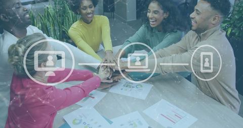 Diverse Team Collaboration Over Digital Strategy in Modern Office