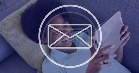 Teen Connecting Online Using Tablet in Cozy Home Setting