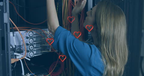 Female IT Technician Managing Network Server Cables
