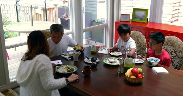 Family Enjoying Breakfast Together in Cozy Home - Download Free Stock Images Pikwizard.com