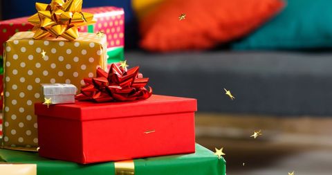 Colorful Christmas Gifts with Floating Gold Stars - Download Free Stock Images Pikwizard.com