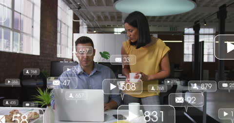 Business Team Analyzing Social Media Data Statistics in Office