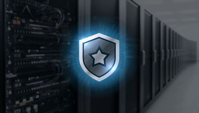 Glowing metal shield emblem protecting data center servers and network infrastructure