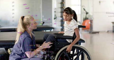 Therapist Assisting Girl in Wheelchair During Rehabilitation Session With Code Overlay