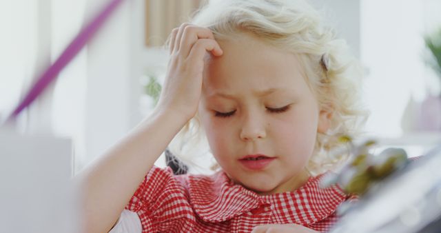 Young Child Concentrating on Problem - Download Free Stock Images Pikwizard.com