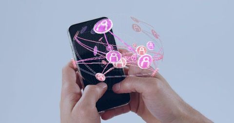 Adult hands holding smartphone projecting holographic social network wireframe globe