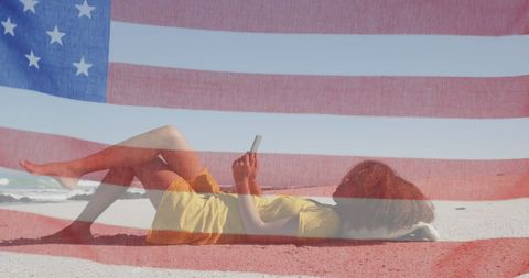 Woman Relaxing on Beach with American Flag Overlay