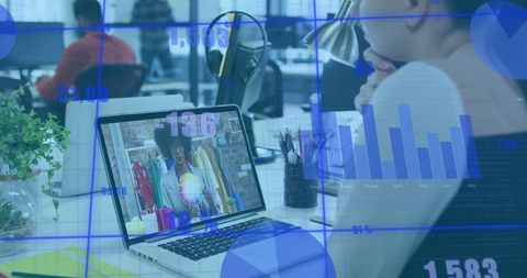 Professional watching remote clothing presentation on laptop in bright office