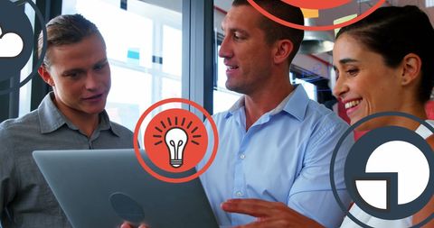 Diverse Team Collaborating on Business Strategy with Technology Icons