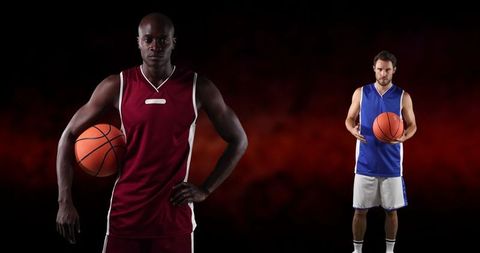 Diverse Basketball Players Posing With Basketball