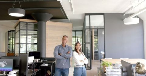 Confident Colleagues Smiling in Modern Office
