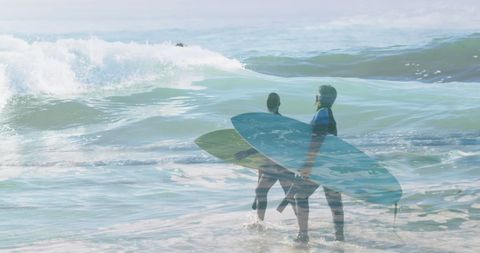 Diverse Couple Entering Ocean with Surfboards, Preparing to Surf - Download Free Stock Images Pikwizard.com