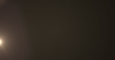 Mesmerizing Glow with Hypnotic Light Movement on Brown Background - Download Free Stock Images Pikwizard.com
