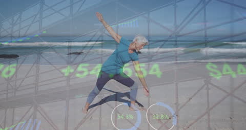 Senior Woman Practicing Yoga with Data Overlay on Beach