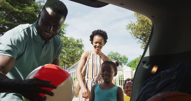 Happy African American Family Packing for a Summer Outing - Download Free Stock Images Pikwizard.com