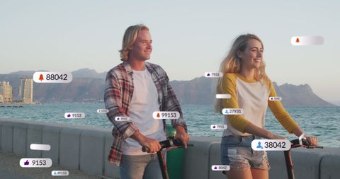Smiling Couple with Social Media Notifications on Seaside Holiday