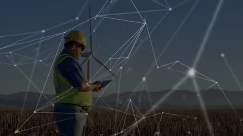 Energy Engineer Diagnosing Wind Turbine with Digital Technology