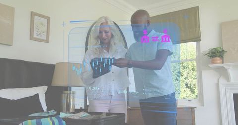 Couple packing suitcase using tablet with augmented reality travel planning overlay