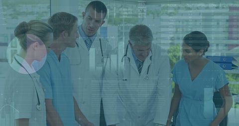 Healthcare Workers Analyzing Medical Data Technology