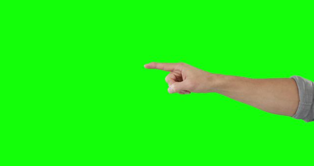 Pointing finger of caucasian man using virtual interface, with copy space on green screen background. Communication, technology and digital interface, unaltered.