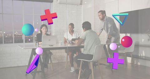 Bearded leader guiding diverse business team during collaborative meeting with ar overlays