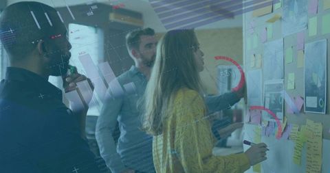 Team Collaborating with Sticky Notes and Digital Data Overlays