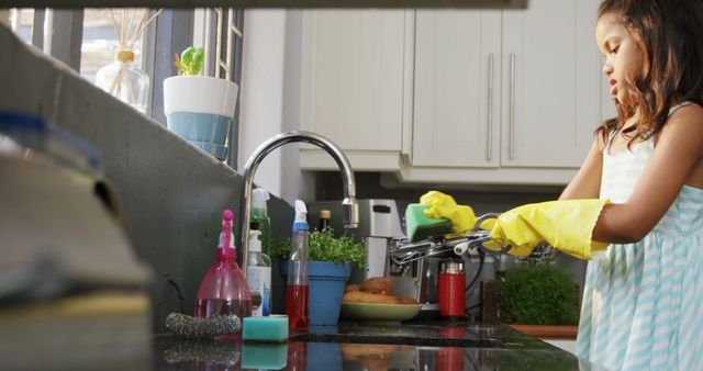 Young Girl Washing Dishes in Modern Kitchen - Download Free Stock Images Pikwizard.com