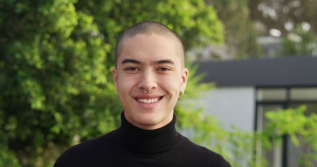 Smiling Biracial Man Enjoying Sunny Day on Rooftop - Download Free Stock Images Pikwizard.com