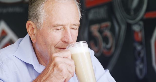 Elderly Man Drinking Latte in Coffee Shop - Download Free Stock Images Pikwizard.com