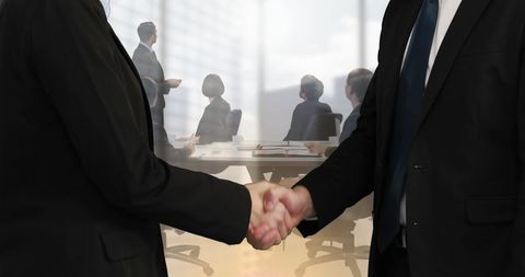 Business Handshake Over Team Meeting Background - Download Free Stock Images Pikwizard.com