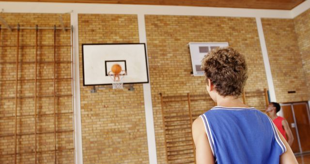 Teen Boys Playing Basketball in Gymnasium - Download Free Stock Images Pikwizard.com