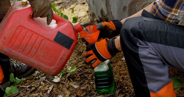 Person Pouring Liquid with Funnel in Outdoor Setting - Download Free Stock Images Pikwizard.com