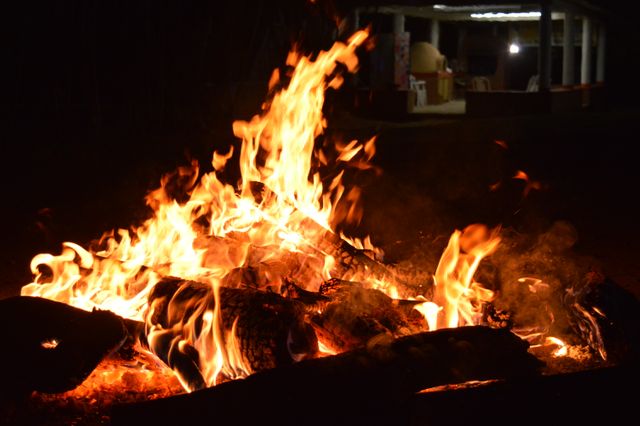 Blazing Outdoor Campfire at Night - Download Free Stock Photos Pikwizard.com