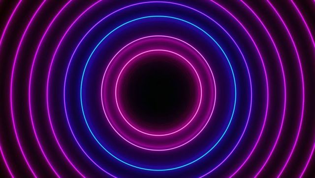 Futuristic neon concentric rings creating glowing tunnel