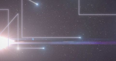 Radiating flare casting beams across starfield with comet trails and linear light frames