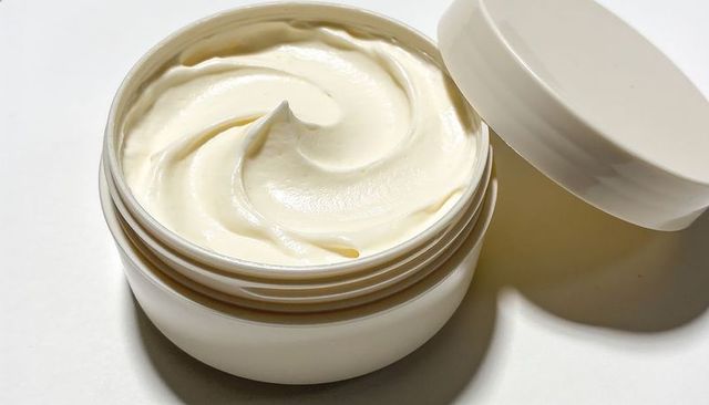Luxurious whipped face cream in white jar with swirl texture for skincare packaging