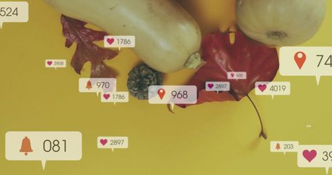 Social media notifications over autumn decor on yellow