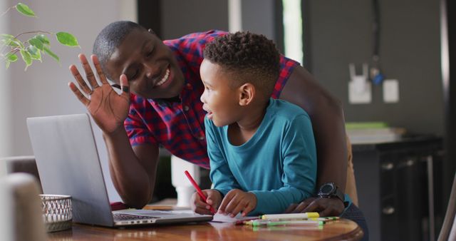 Father and Son Enjoying Quality Time Together With Laptop - Download Free Stock Images Pikwizard.com