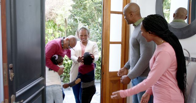 Family Meeting Grandparents at Front Door with Joyful Hugs - Download Free Stock Images Pikwizard.com