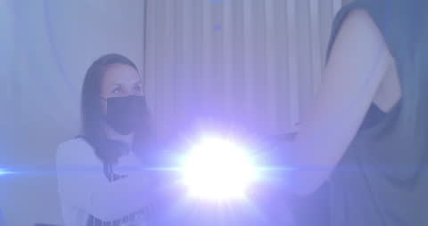 Masked Server With Enigmatic Light in Modern Cafe