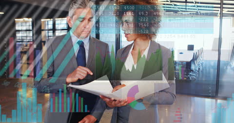 Diverse Professionals Analyzing Business Reports with Graphs