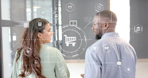 Professionals discussing e-commerce solutions in modern office