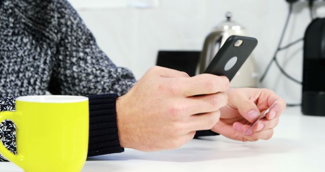 Person Holding Credit Card Using Smartphone for Online Shopping - Download Free Stock Images Pikwizard.com