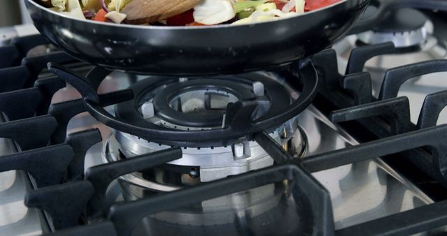 Frying Pan on Gas Stove Cooking Vegetables in Kitchen - Download Free Stock Images Pikwizard.com